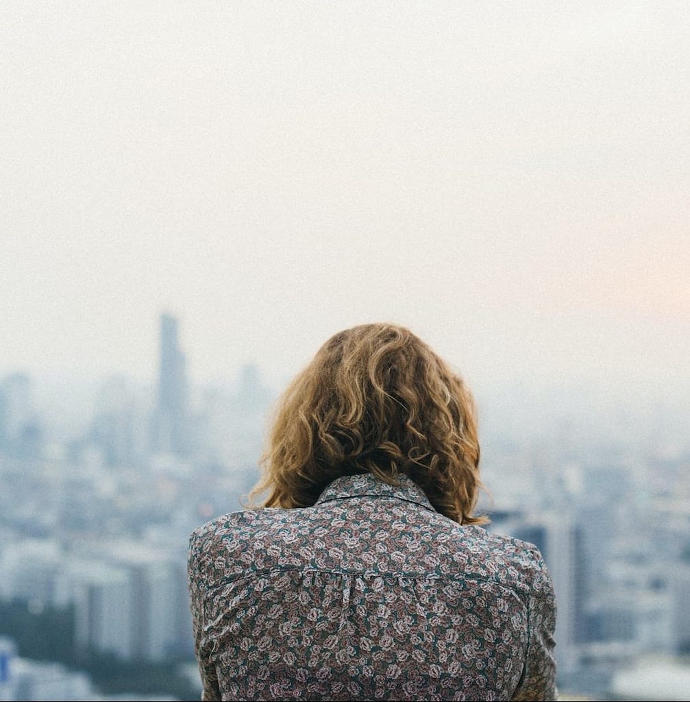 Blond woman at a rooftop